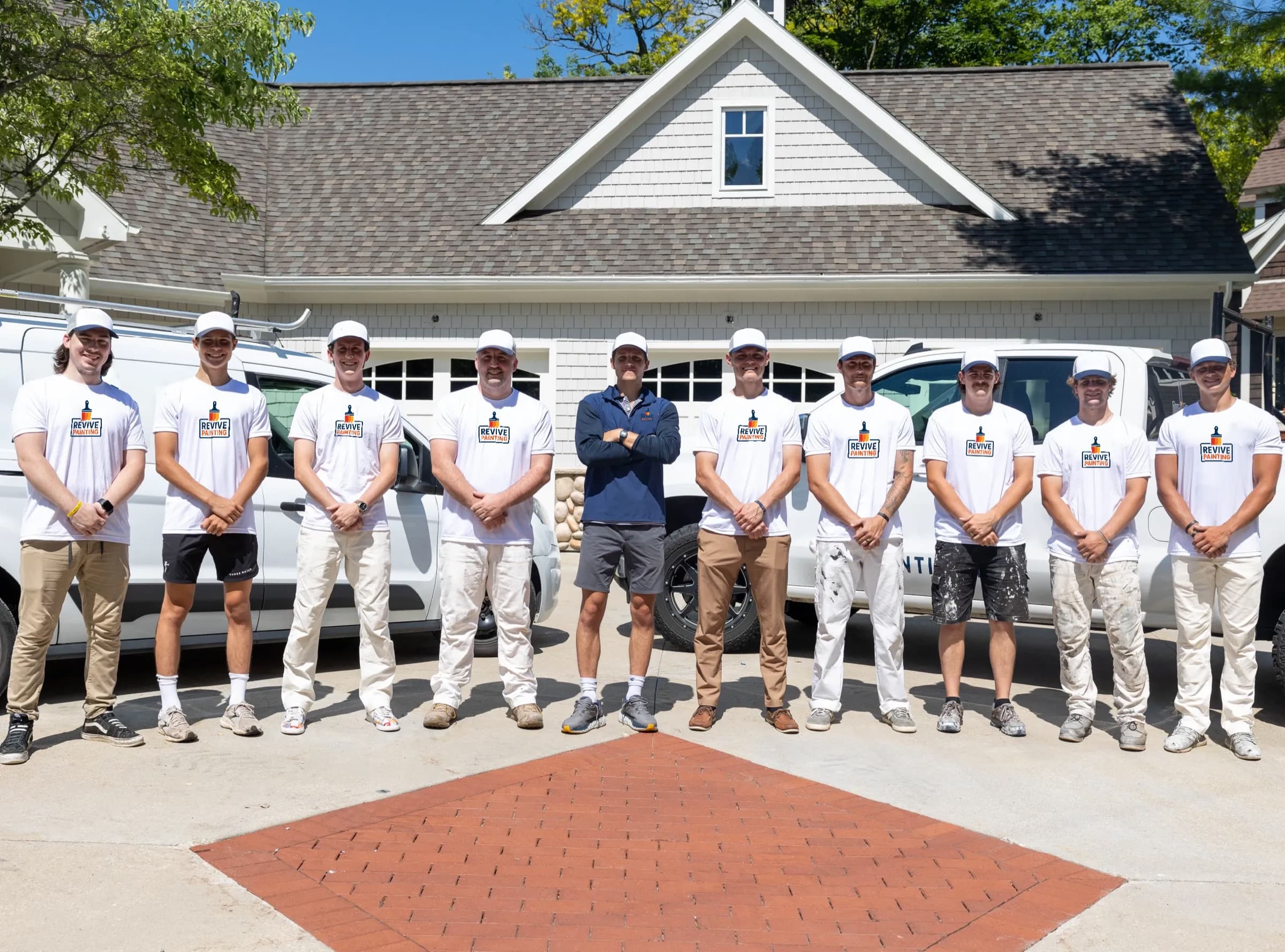 The Revive Painting team in branded uniforms
